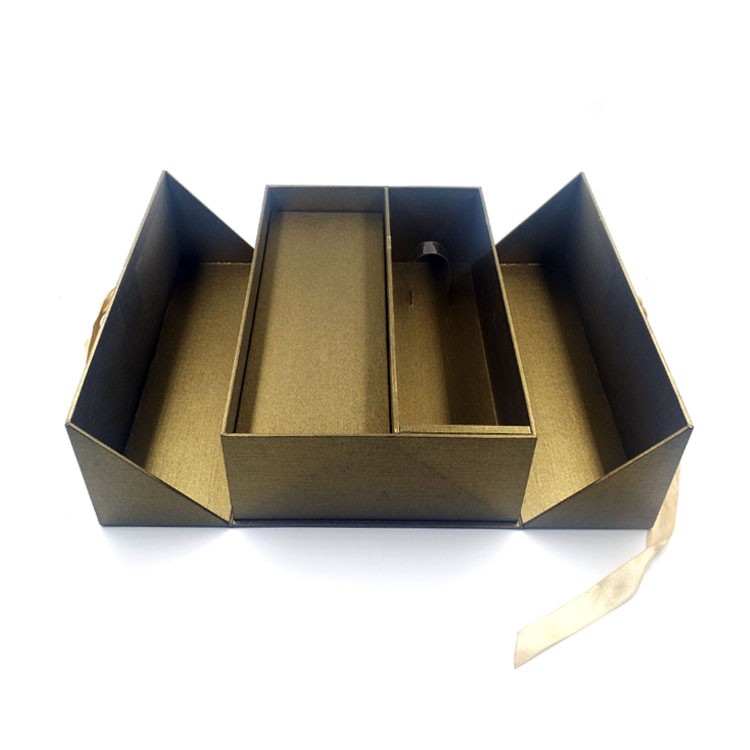Golden wine box with ribbon closure